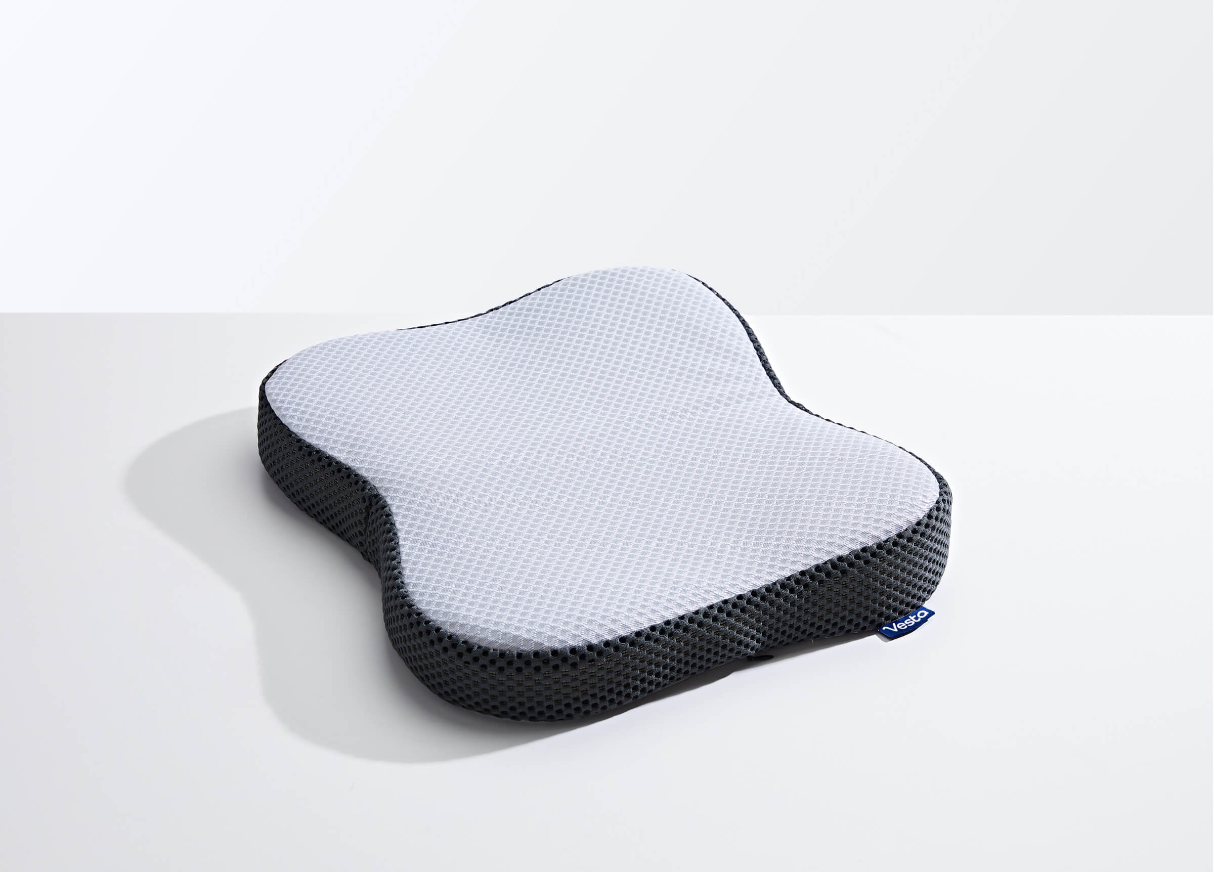 Seat cushion clearance for spinal stenosis